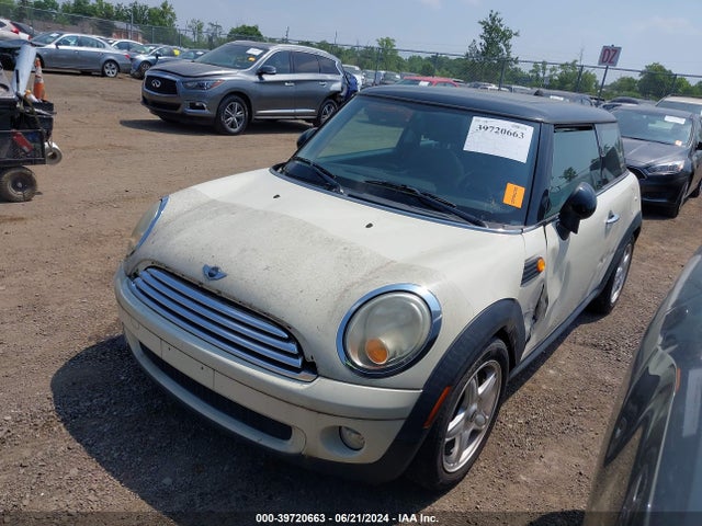2007 MINI COOPER WMWMF335X7TT50928 Photo 1