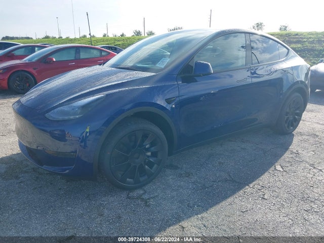 2024 TESLA MODEL Y 7SAYGDED3RF091395 Photo 1