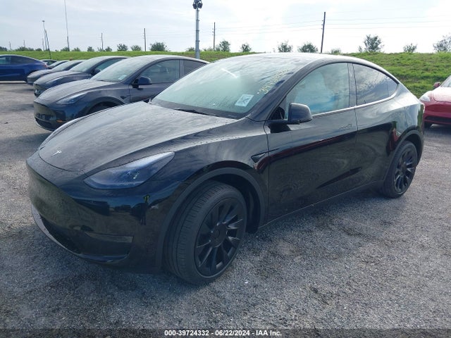 2024 TESLA MODEL Y 7SAYGDED4RF089896 Photo 1
