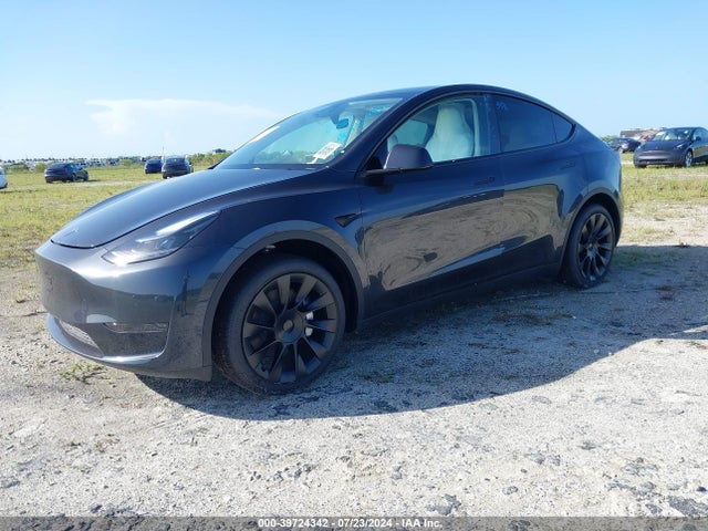 2024 TESLA MODEL Y 7SAYGDED5RF089311 Photo 1