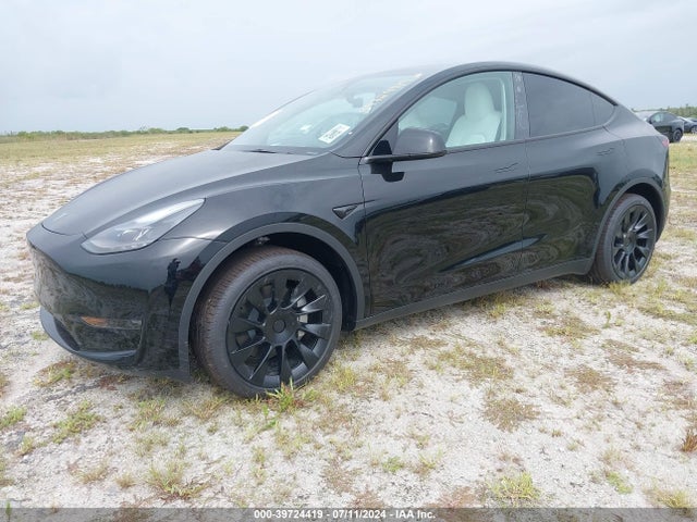2024 TESLA MODEL Y 7SAYGDED9RF092910 Photo 1