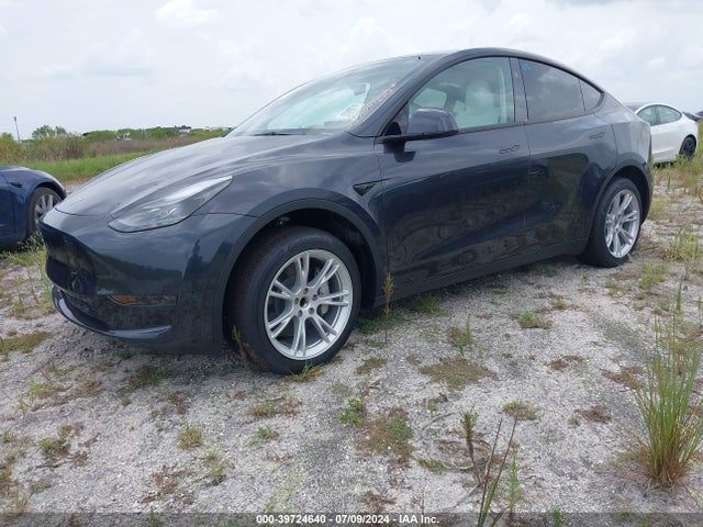 2024 TESLA MODEL Y 7SAYGDED7RF087401 Photo 1