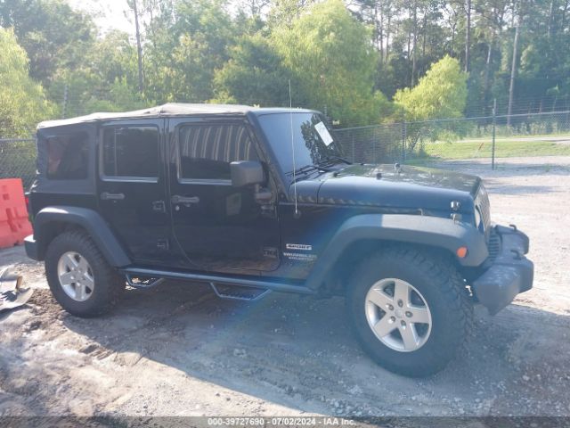 1C4HJWDG2EL195521 Jeep Wrangler Unlimited Sport
