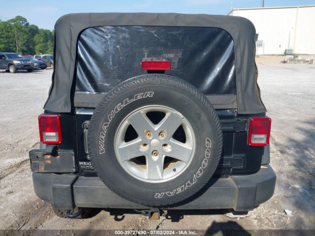 1C4HJWDG2EL195521 Jeep Wrangler Unlimited Sport