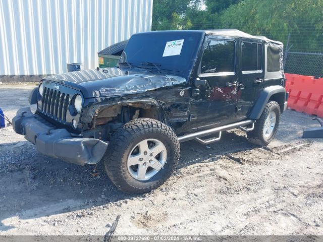 1C4HJWDG2EL195521 Jeep Wrangler Unlimited Sport