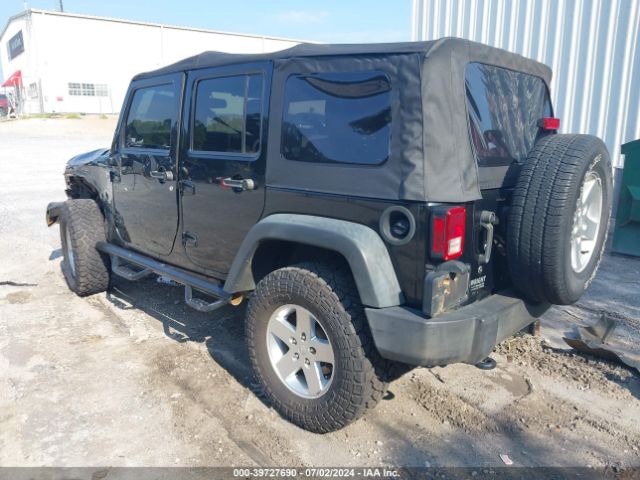 1C4HJWDG2EL195521 Jeep Wrangler Unlimited Sport