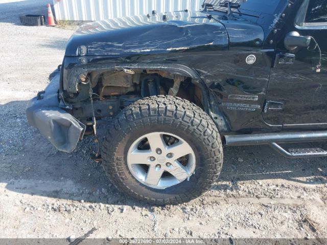 1C4HJWDG2EL195521 Jeep Wrangler Unlimited Sport