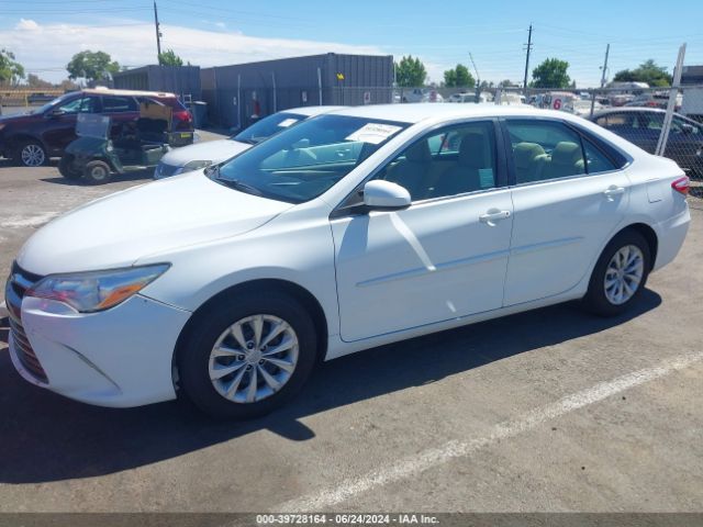 4T1BD1FK9FU163254 Toyota Camry Hybrid Le