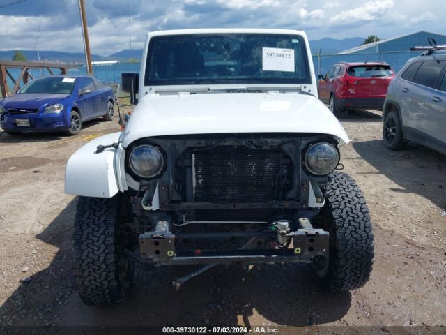 1C4BJWEG3EL315797 Jeep Wrangler Unlimited Sahara