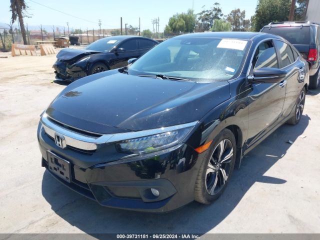JHMFC1F98JX015687 Honda Civic Touring