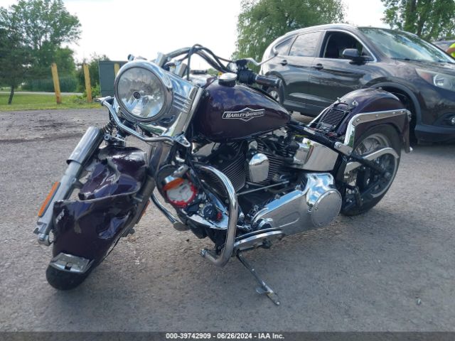 2010 HARLEY-DAVIDSON FLSTC 1HD1BW516AB029011 Photo 1