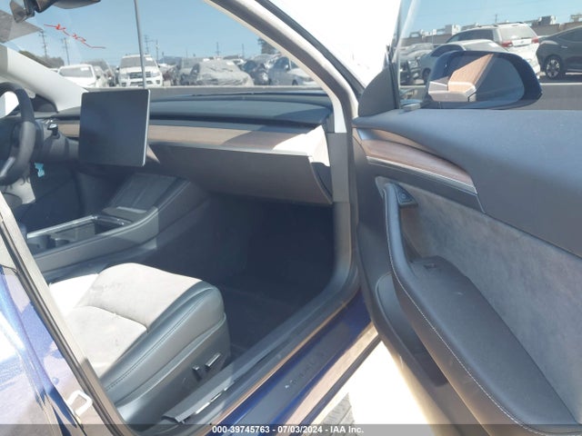 2023 TESLA MODEL 3 5YJ3E1EA0PF615052 Photo 4