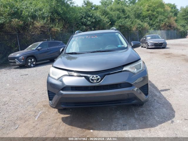 2T3BFREV4GW421242 Toyota RAV4 LE