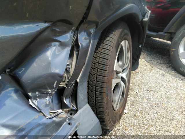 2T3BFREV4GW421242 Toyota RAV4 LE