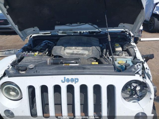 1C4BJWEG4EL212937 Jeep Wrangler Unlimited Sahara
