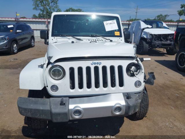 1C4BJWEG4EL212937 Jeep Wrangler Unlimited Sahara