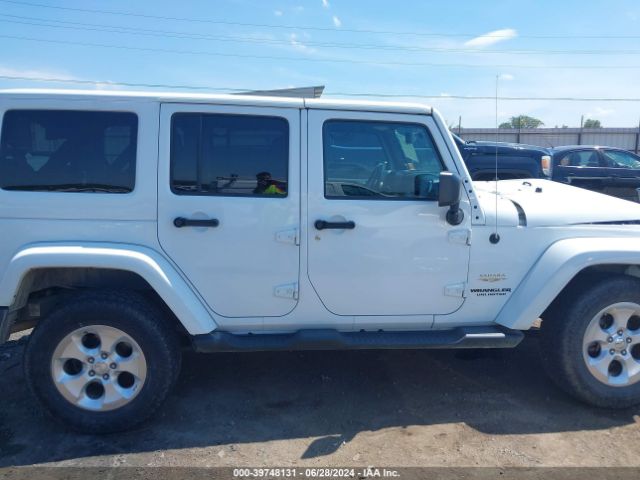 1C4BJWEG4EL212937 Jeep Wrangler Unlimited Sahara