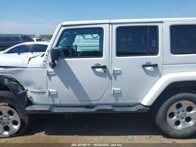 1C4BJWEG4EL212937 Jeep Wrangler Unlimited Sahara