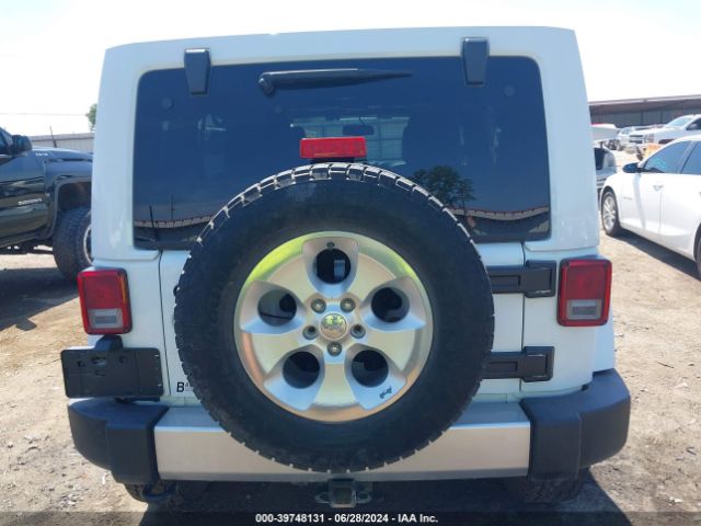 1C4BJWEG4EL212937 Jeep Wrangler Unlimited Sahara