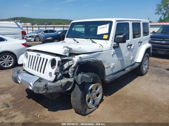 1C4BJWEG4EL212937 Jeep Wrangler Unlimited Sahara