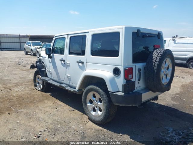 1C4BJWEG4EL212937 Jeep Wrangler Unlimited Sahara