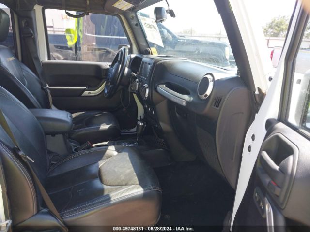 1C4BJWEG4EL212937 Jeep Wrangler Unlimited Sahara