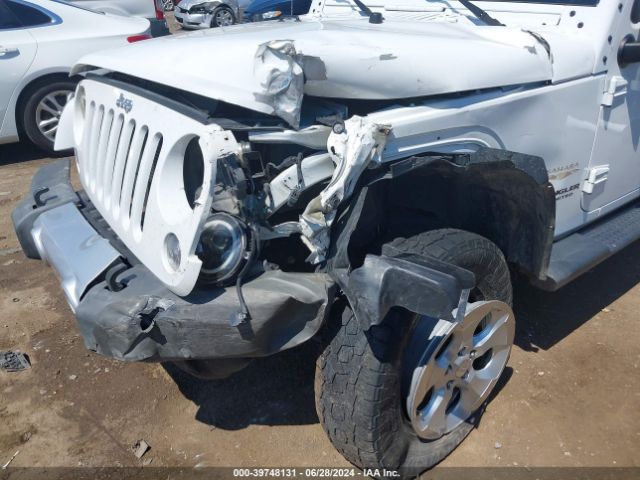 1C4BJWEG4EL212937 Jeep Wrangler Unlimited Sahara