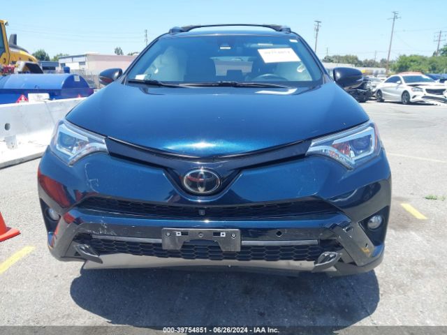 JTMNFREV4JJ200940 Toyota RAV4 SE