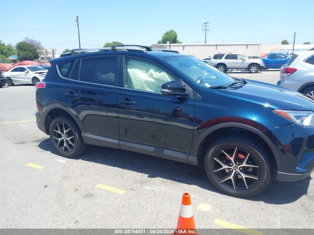 JTMNFREV4JJ200940 Toyota RAV4 SE