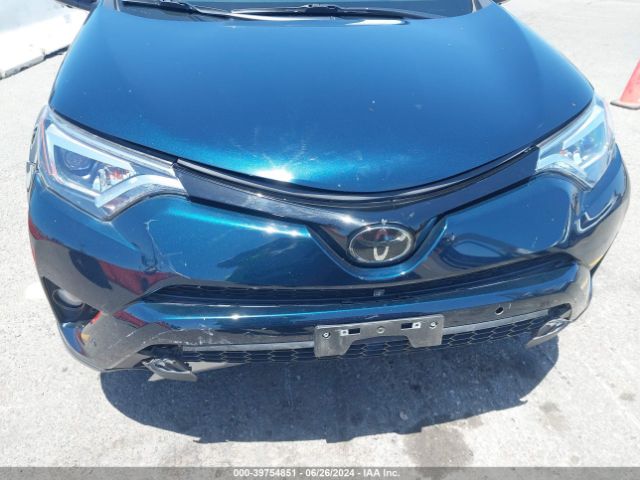 JTMNFREV4JJ200940 Toyota RAV4 SE