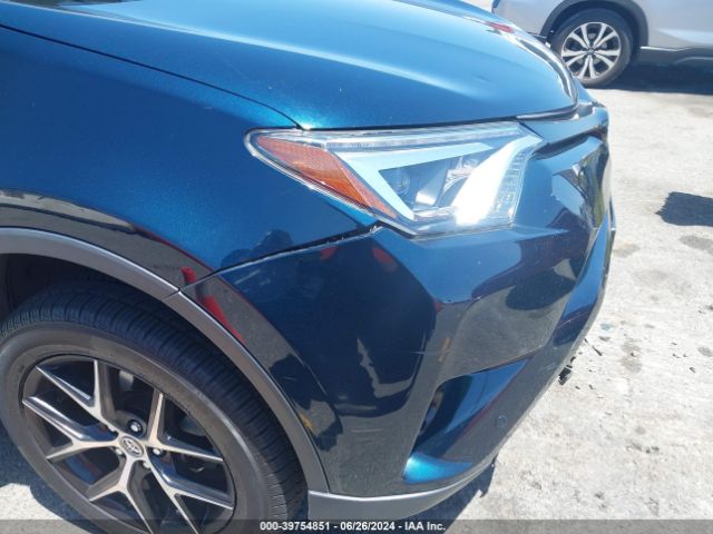 JTMNFREV4JJ200940 Toyota RAV4 SE