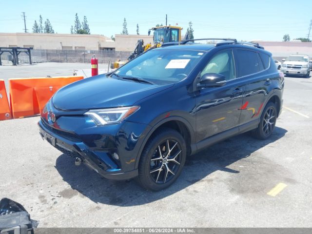 JTMNFREV4JJ200940 Toyota RAV4 SE