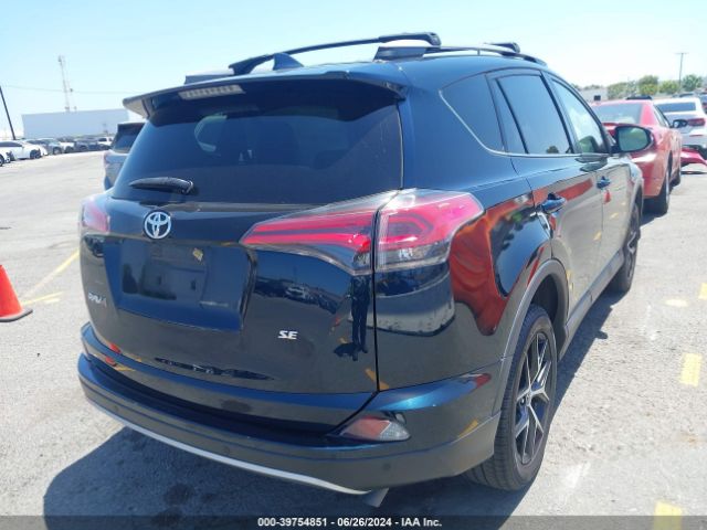 JTMNFREV4JJ200940 Toyota RAV4 SE