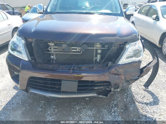 JN8AY2ND0KX008649 Nissan Armada Sl