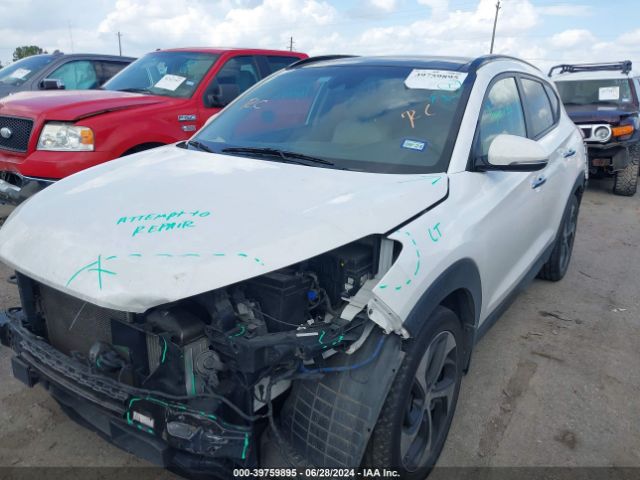 KM8J3CA2XGU035740 Hyundai Tucson Limited