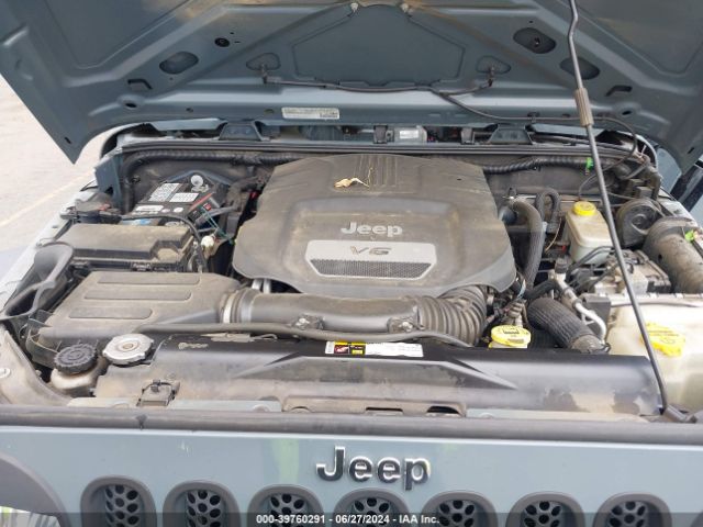 1C4BJWDG9EL238399 Jeep Wrangler Unlimited Sport