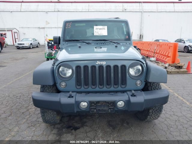 1C4BJWDG9EL238399 Jeep Wrangler Unlimited Sport