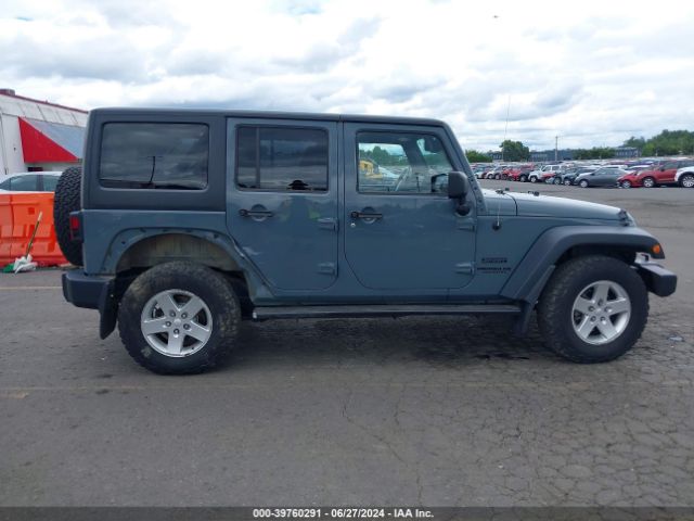 1C4BJWDG9EL238399 Jeep Wrangler Unlimited Sport