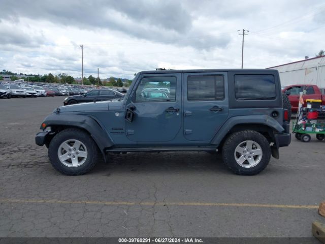 1C4BJWDG9EL238399 Jeep Wrangler Unlimited Sport