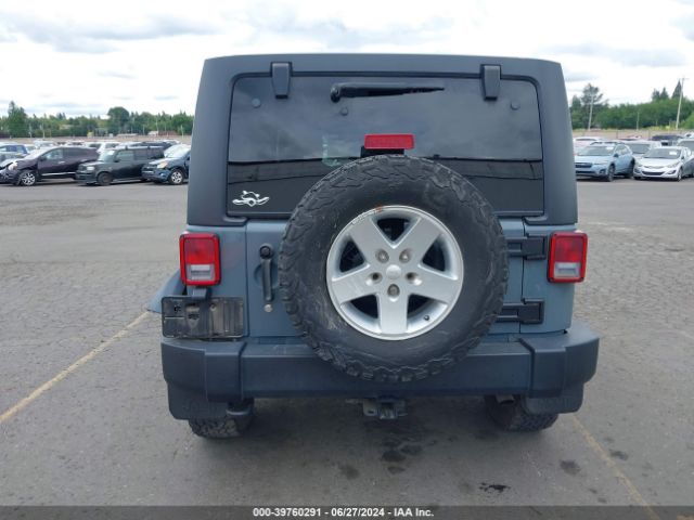 1C4BJWDG9EL238399 Jeep Wrangler Unlimited Sport
