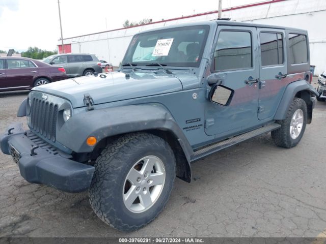 1C4BJWDG9EL238399 Jeep Wrangler Unlimited Sport