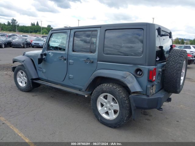 1C4BJWDG9EL238399 Jeep Wrangler Unlimited Sport