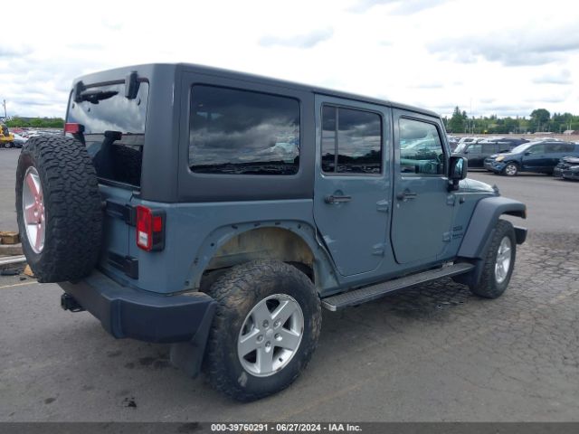 1C4BJWDG9EL238399 Jeep Wrangler Unlimited Sport