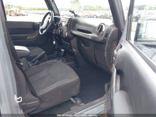 1C4BJWDG9EL238399 Jeep Wrangler Unlimited Sport