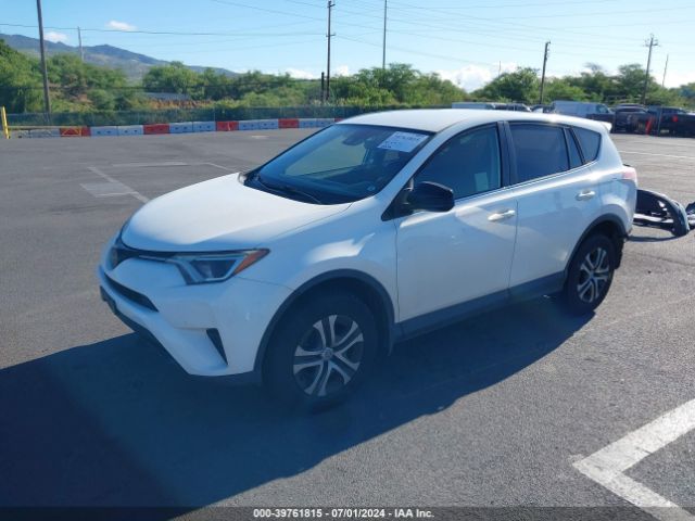 JTMZFREV0JJ166951 Toyota RAV4 LE