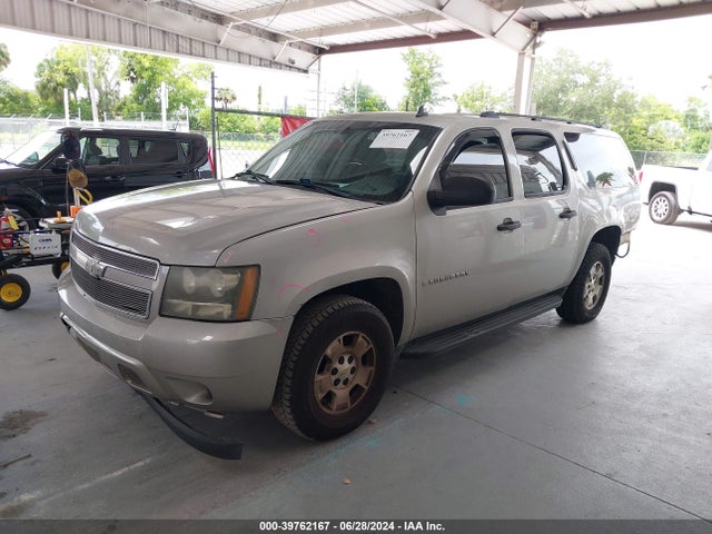 2009 CHEVROLET SUBURBAN 1GNFC16059R217039 Photo 1