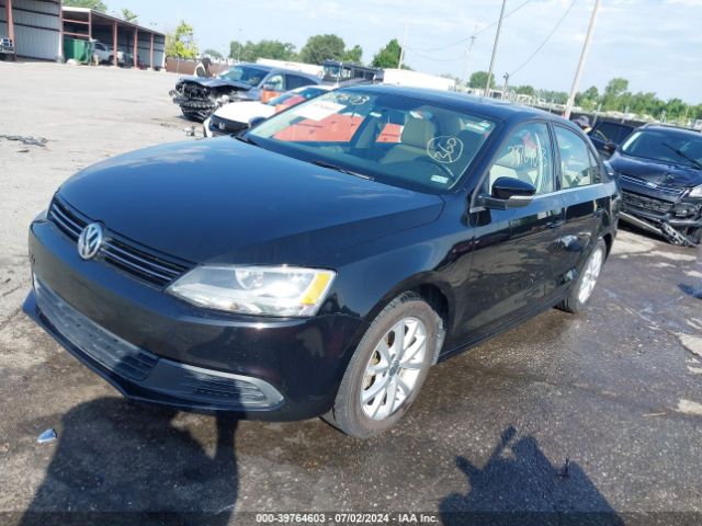 3VWD17AJ2EM425882 Volkswagen Jetta 1.8t Se