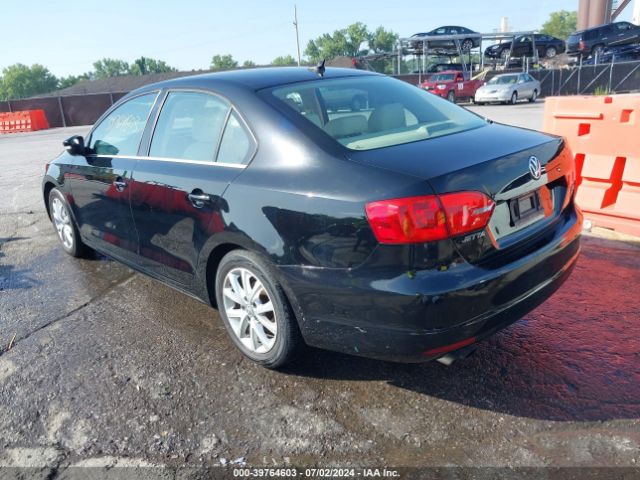 3VWD17AJ2EM425882 Volkswagen Jetta 1.8t Se