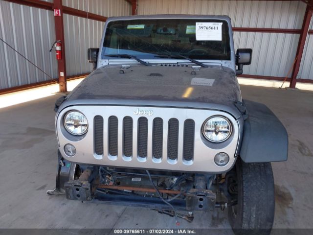 1C4AJWAG7GL305309 Jeep Wrangler Sport