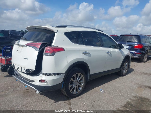 Toyota Rav4 Limited 2016 JTMYFREV5GJ068115 Image 4
